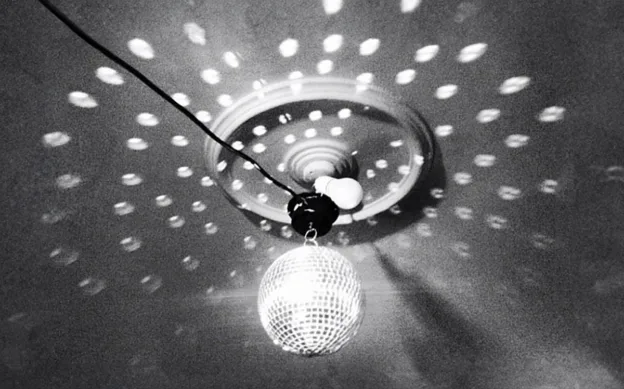 A black and white photo of a light with a polka dot pattern, inspired by Danish New Years.