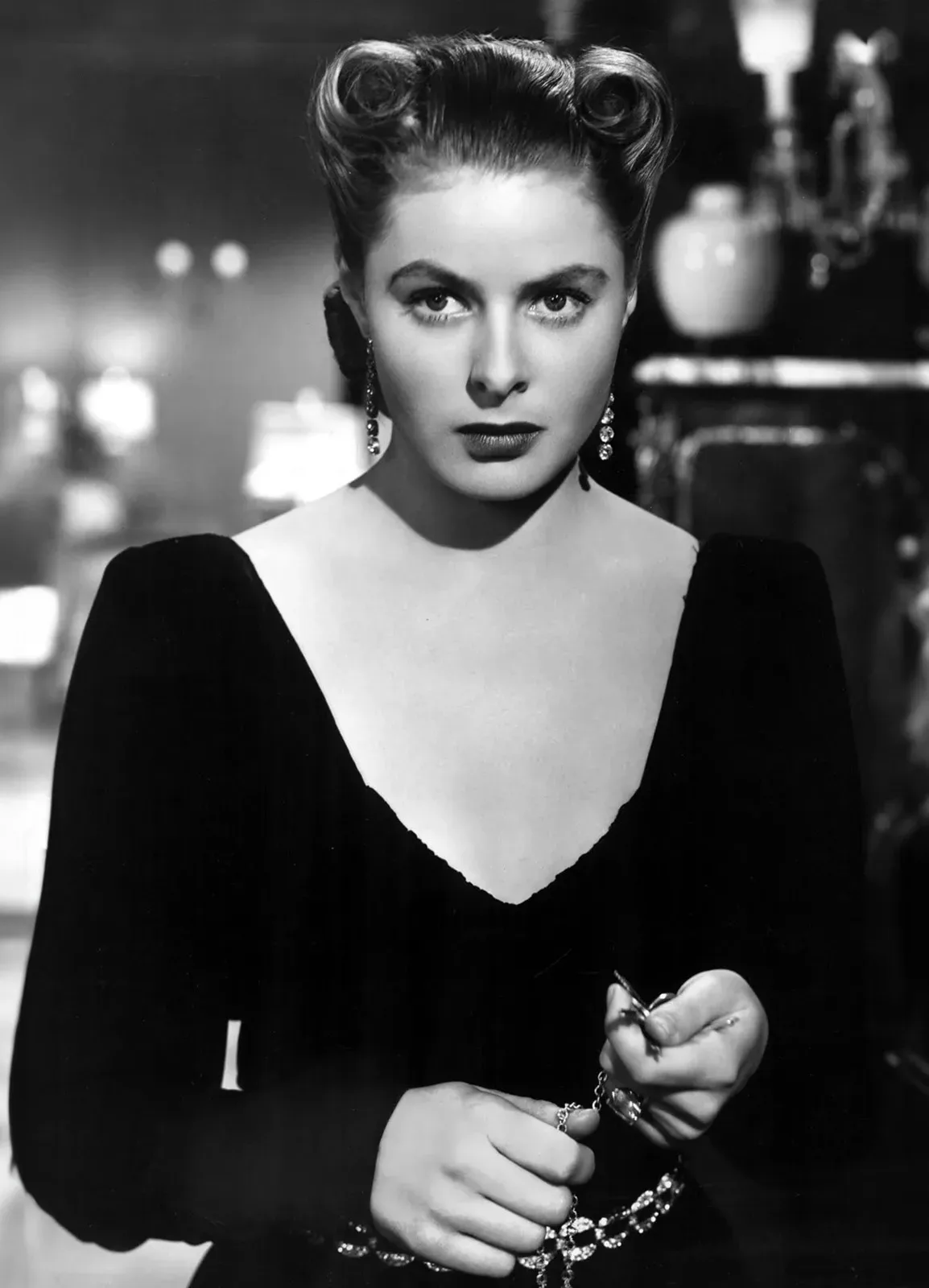 A black and white photo of Ingrid Bergman in a dress.