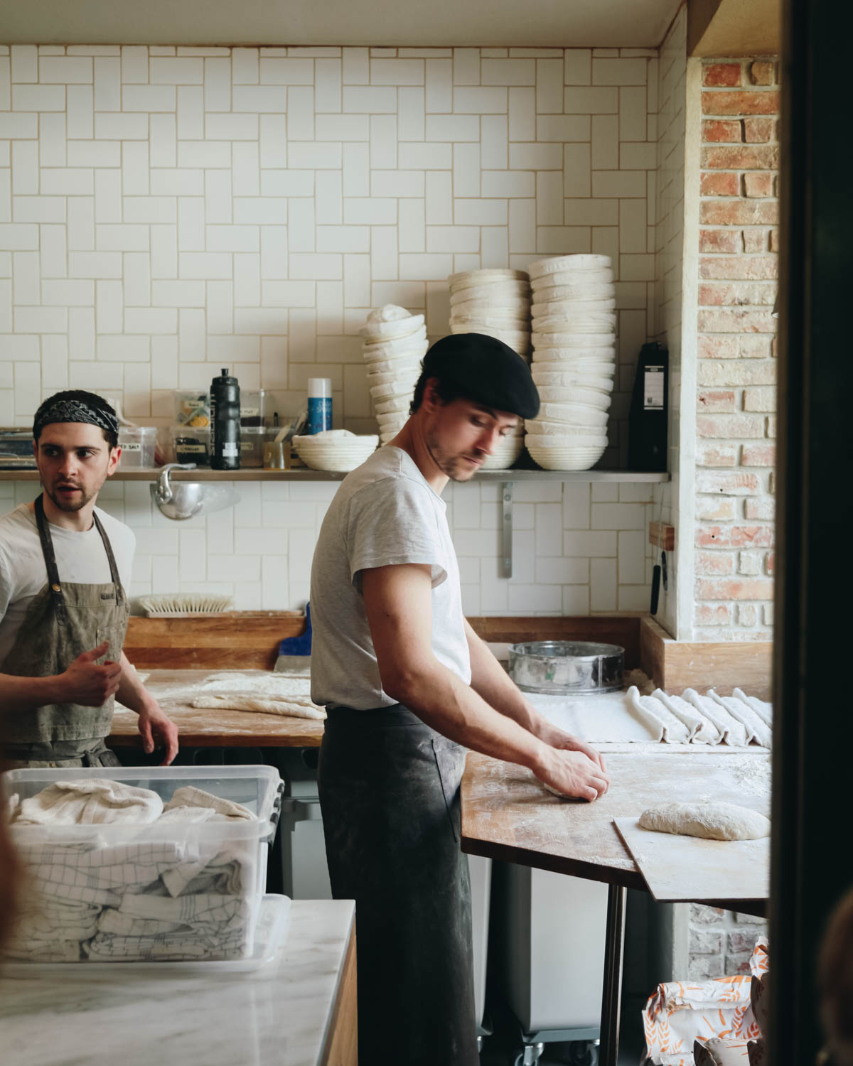 Two men working in a Copenhagen restaurant kitchen.