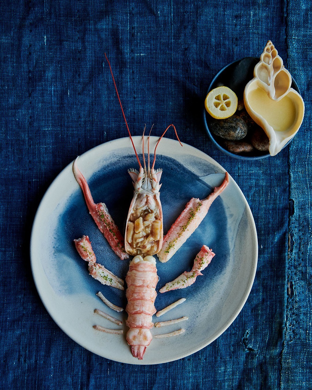 A plate of Norwegian Langoustine served with a mussel sauce and wild quince