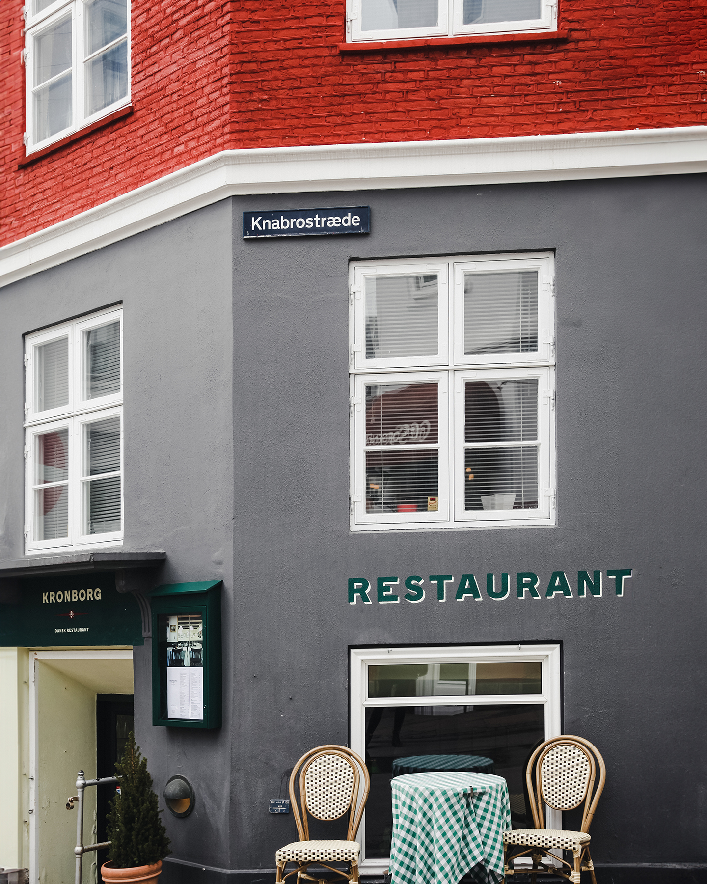 A table and chairs outside of a Copenhagen restaurant.