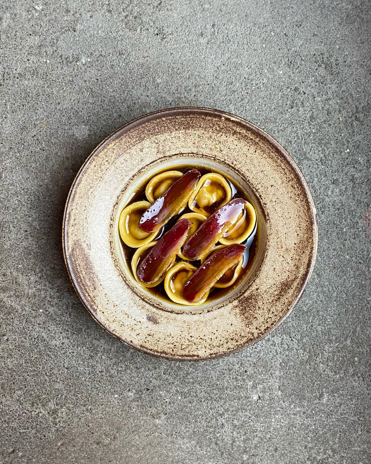 A plate with noodles and sauce at a Copenhagen restaurant.