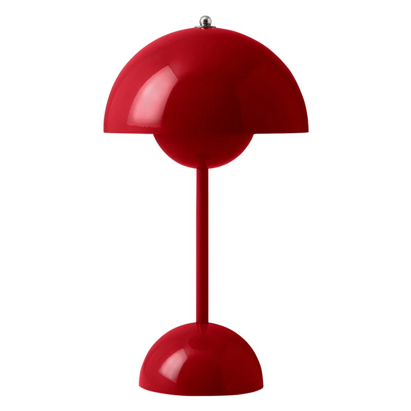 A white table lamp with a wooden base, perfect for Scandinavian gifts.